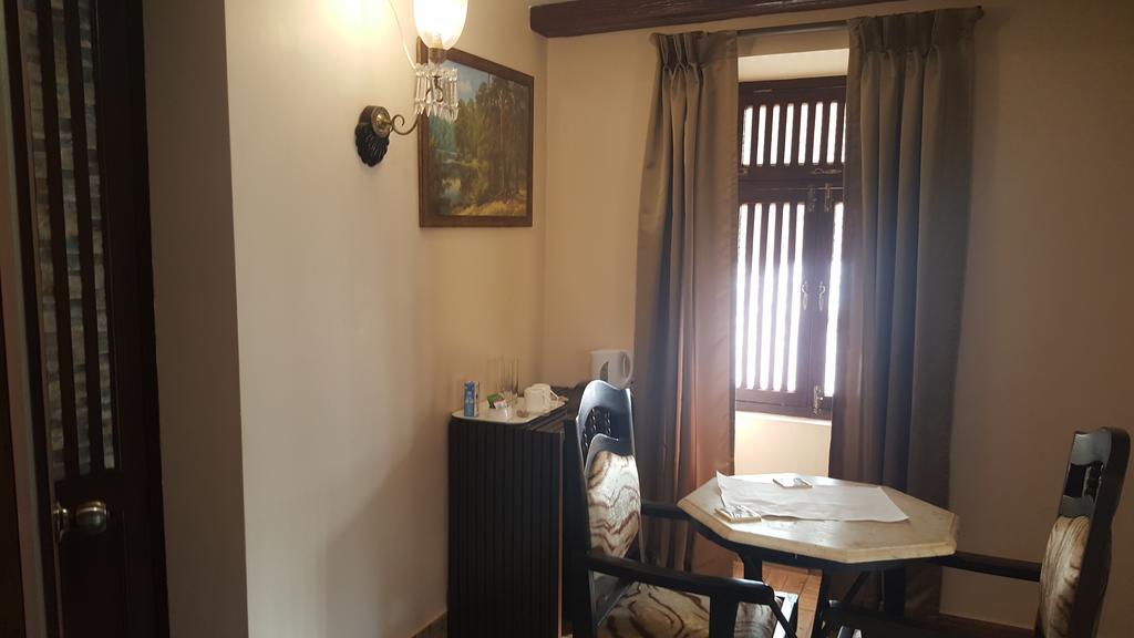 Casa Menezes - A Heritage Goan Homestay Bambolim Pokoj fotografie